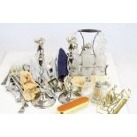 A box of silver plated cutlery to also include cruet set and candlesticks.