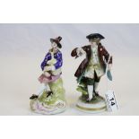Antique Derby figure of a seated bagpiper and a 19th century figure of a Dandy marked to underside