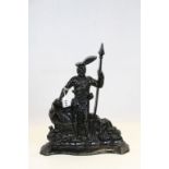 Cast iron door stop of a Scottish soldier