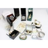 A box of mixed costume jewellery and watches.