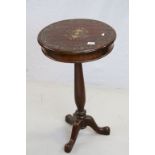 Three legged round top table