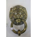 Antique lion mask brass door knocker.