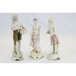 Three Continental ceramic Figurines to include Royal Dux Fisherman with catch, numbered 328 and