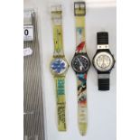 Two cased Swatch watch's and one other 1996.