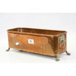 Copper Planter with Brass Lion Mask Handles and Four Brass Lion Paw Feet, 39cms long