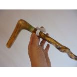 Walking Stick with Two Point Antler Handle inset with a Silver Coin together with Antler Handled