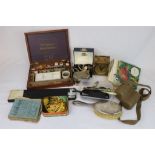 Box of mixed collectables to include Smiths Brass clock, Silver backed brush, Cigarette cards etc