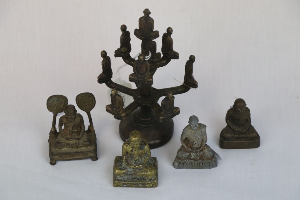 Bronze stand with nine Buddhist Monks plus four other Thai Monks