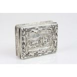 Victorian silver snuff box with cast hunting scene decoration to the hinged lid depicting horse,