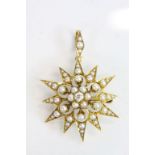 Late Victorian / Edwardian diamond and seed pearl unmarked gold star pendant brooch, the twelve