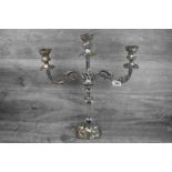 Large silver three light candelabrum with central sconce and two branches, cast foliate scroll and