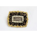 Early Victorian seed pearl and enamelled gold plated mourning brooch, the glazed panel to centre