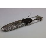 Edwardian silver glasses case with floral and foliate scroll decoration in relief, initialled oval