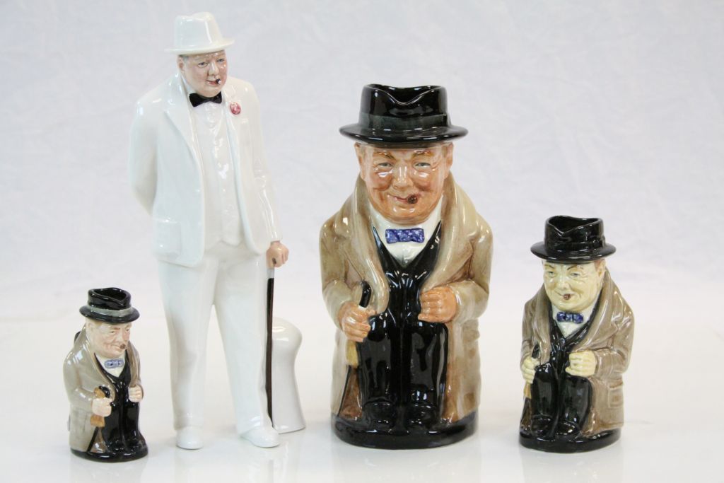 Three Royal Doulton "Winston Churchill" ceramic Character jugs in varying sizes, the largest