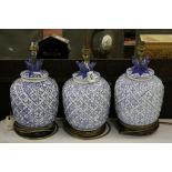 Three Blue & White Ceramic Lamps with a Pineapple design, all on wooden bases and approx 28cm