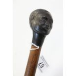 Hardwood walking Stick with Ebony African head knop, approx 90cm long in total