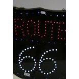 A Route 66 LED light up road sign.