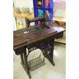 Early 20th century Oak Singer Sewing Machine Treadle Table with Partial Iron Base, 86cms wide x