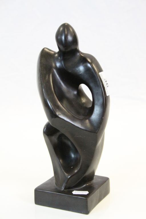 Abstract figural Sculpture with black finish, stands approx 29cm