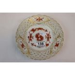 Meissen 7" side plate with oriental dragon decoration with lattice work edging.