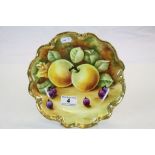 Coalport Gilded plate with hand painted image of Fruit & signed "C Gidman", approx 23cm diameter