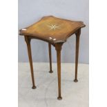 Early 20th century Oak sidetable with Shaped Top and raised on turned tapering legs and pad feet,