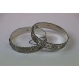 Two Hallmarked Silver Bangle type bracelets with chased Engraving