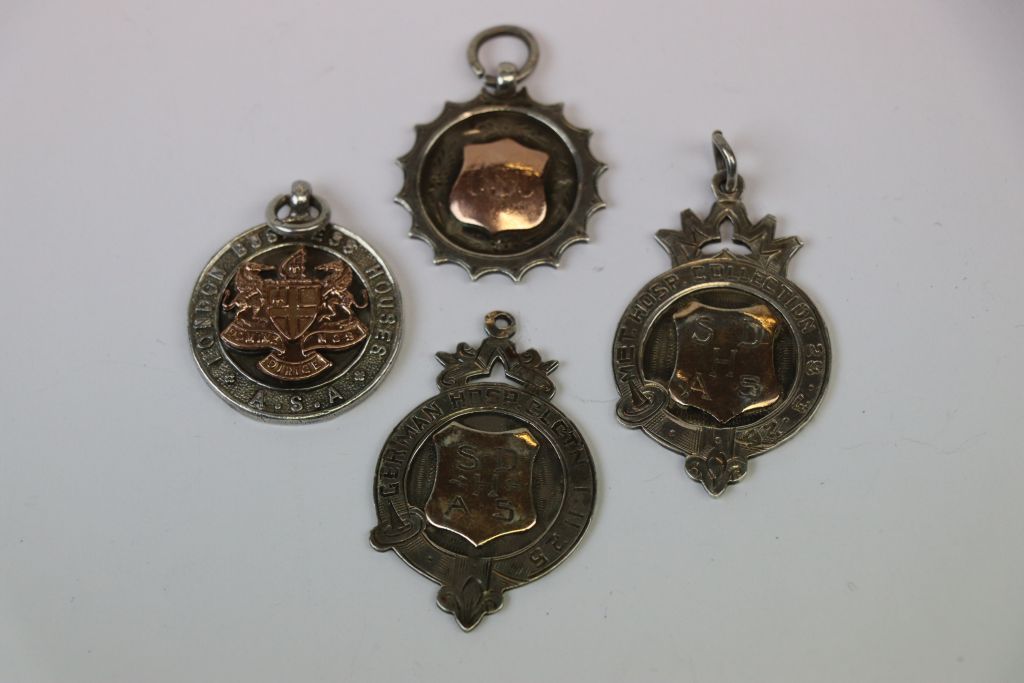 Four silver watch fobs from the 1920s including nursing and sports - Image 2 of 3