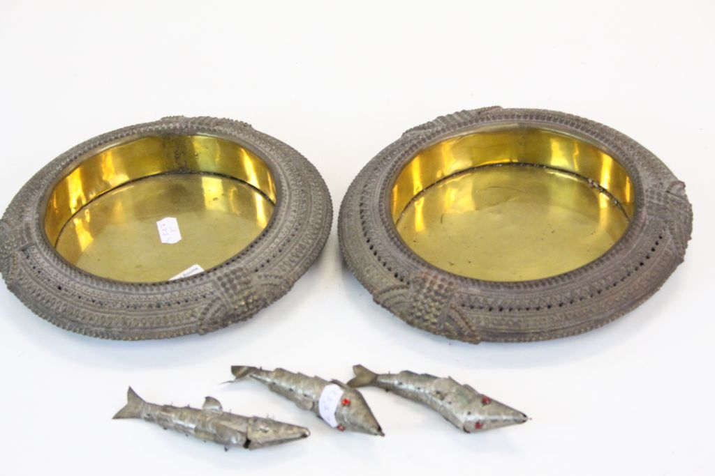 Pair of Middle Eastern brass and copper bowls, three articulated fish