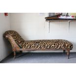 Late Victorian Chaise Lounge raised on turned ringed legs and castors, 179cms long