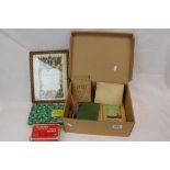 A box of collectables to include a selection of silver coins, postcards, toy soldiers and ephemera.