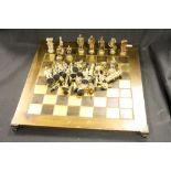 Chessboard and chess set of metal construction by Art & Decoration.