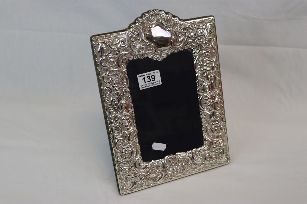 A hallmarked silver easel back photograph frame. - Image 2 of 5