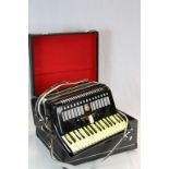 Chinese vintage cased Accordion, marked "Studio" to inside of case and "Beijing" to the Accordion