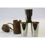 Set of Three Silver Plated Stacking Hunting Stirrup Cups with Gilt Lining contained in a Brown