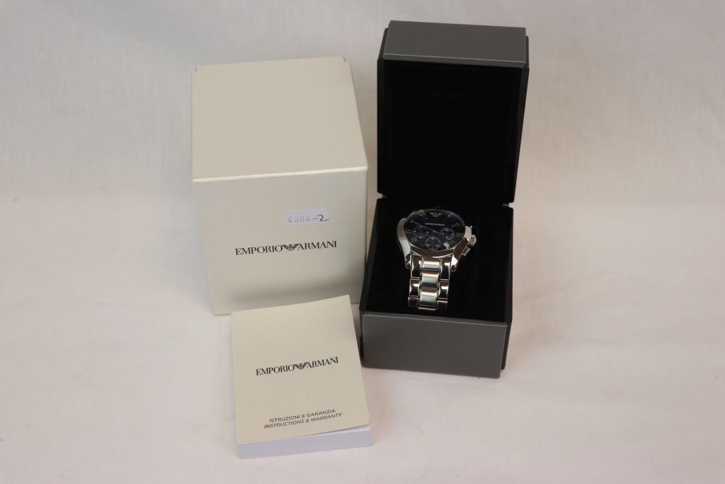 Boxed Gents Emporio Armani Chronograph wristwatch, with blued metallic dial, three sub dials and