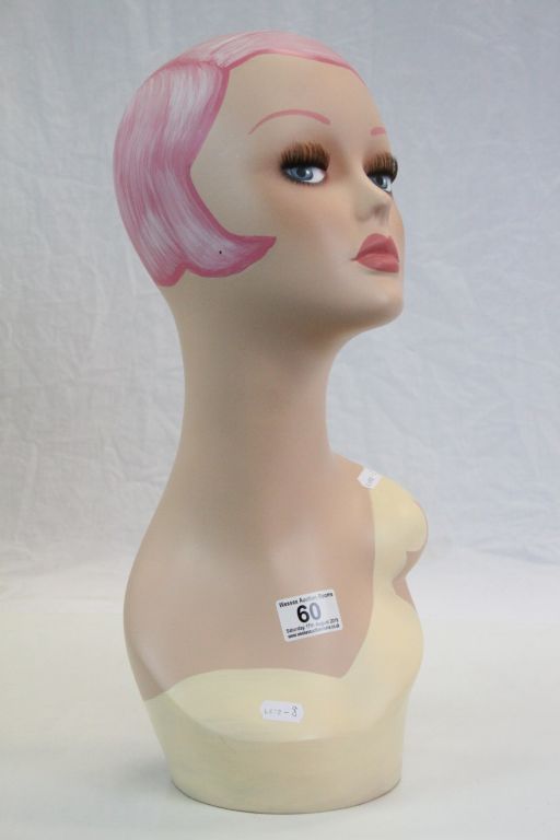 Art Deco style mannequin head, with pink hair and pink lips, stands approx. 45 cm