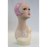 Art Deco style mannequin head, with pink hair and pink lips, stands approx. 45 cm