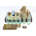 Mixed collectables to include glass lemonade bottles with marbles, tins and a carved wooden figure