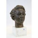 Cold cast bust of a females head on a marble base, stands approx. 39cm