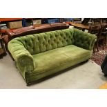 Victorian Green Upholstered Button Back Chesterfield Sofa raised on bun feet and castors, 192cms