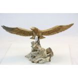 Carved wooden model of an Eagle with wingspan approx 63cm across