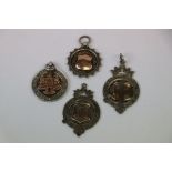 Four silver watch fobs from the 1920s including nursing and sports