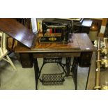 Early 20th century Oak Singer Sewing Machine Treadle Table with Partial Iron Base, 92cms wide x