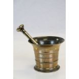 Antique bronze pestle and mortar.