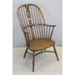 Ercol swan back Windsor armchair with crinoline stretcher