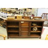 Early 20th century Oak Bookcase / Side Cabinet with Central Panel Door flanked either side by