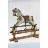 Victorian Carved Painted Dapple Grey Wooden Rocking Horse with Leather Bridle and Saddle held on a