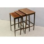 Edwardian Nest of Three Mahogany Inlaid Tables each raised on square tapering slender legs,