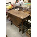 Antique Oak Oval Gate-leg Table with Drawer to End and raised on turned and block supports, 108cms